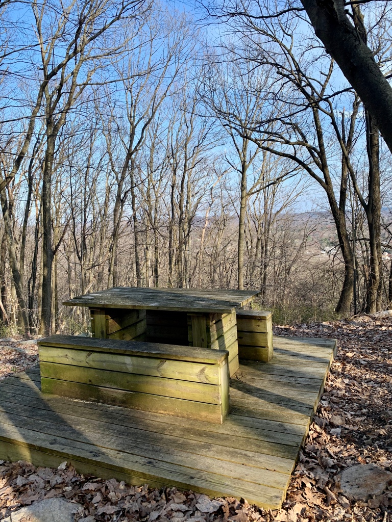 Picnic table with view of Succasunna Valley on Veterans yellow trail
